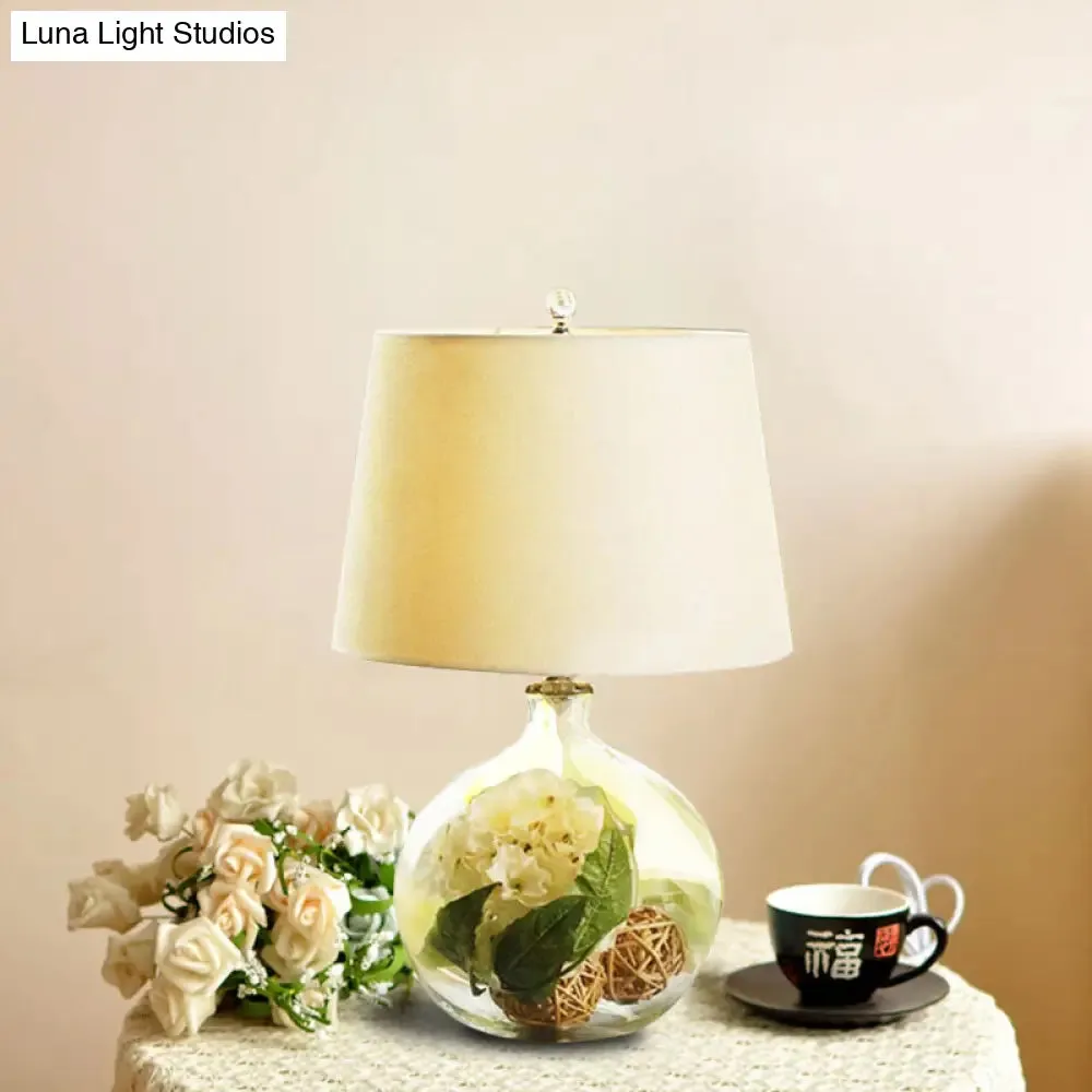 1-Light Fabric White Nightstand Lamp with Industrial Tapered Design and Floral Rattan Ball Decor