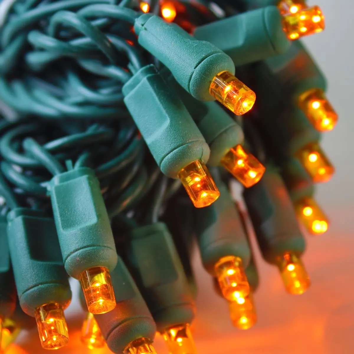 50-light  5mm Orange LED Christmas Lights, 4" Spacing Green Wire